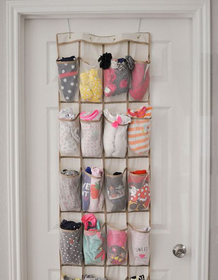 Baby clothes organised in shoe hanger